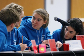 Members of the team from Fauquier High School in Warrenton brainstorm during the 2020 in-person Blue Crab Bowl. © Aileen Devlin | Virginia Sea Grant.