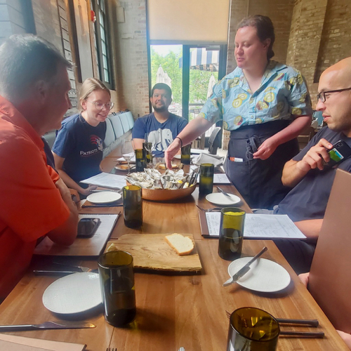 No shellfish aquaculture course would be complete without a tray of half-shell oysters. From L: course instructor Dr. Bill Walton, graduate students Abbey Sisti and David Arancibia, their True Chesapeake server, and master’s student Matt LaGanke.