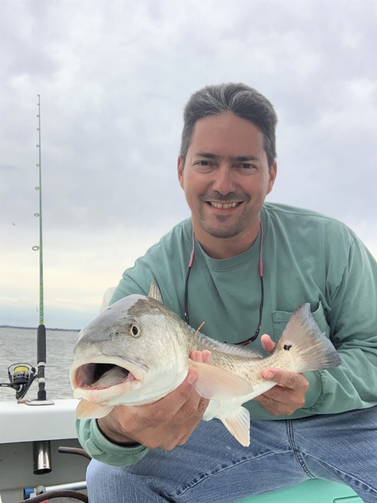 Alex with a tagged fish.