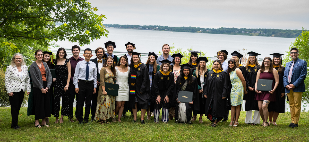 VIMS 2023 graduates celebrate overlooking the water. Photo Credit: Miguel Montalvo