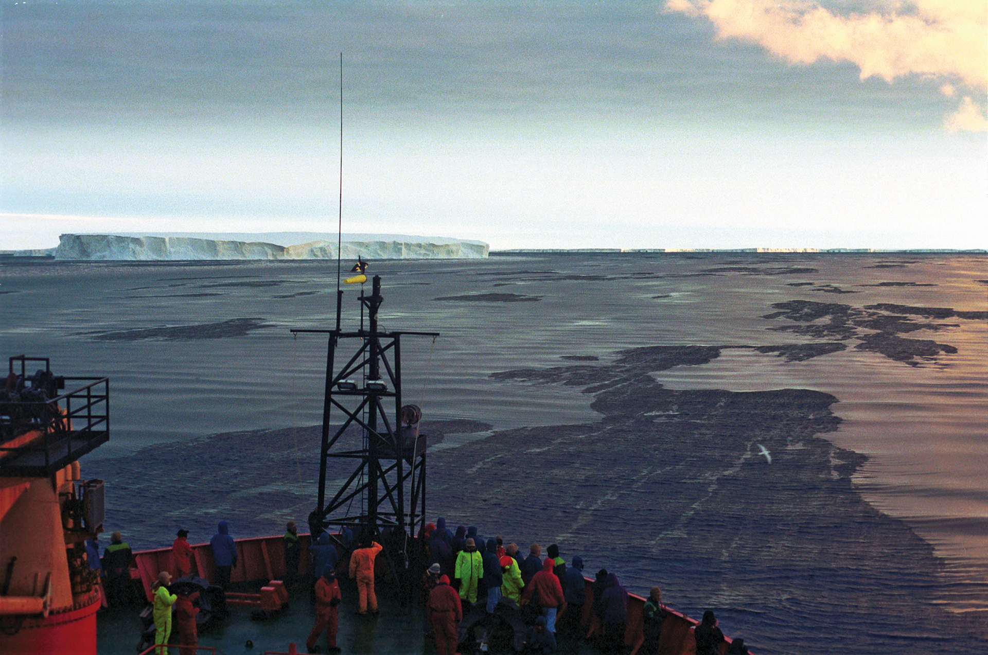 Scientists aboard the Australian research vessel Aurora Australis investigating the results of adding iron to stimulate a phytoplankton bloom in the Southern Ocean in 2001. (Photo by: Ken Buesseler)