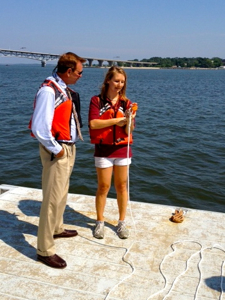 VIMS graduate student Kelsey Fall discusses her research aboard the RV Pelican with Senate staffer Clyde Cristman. Photo by Jennifer Latour.