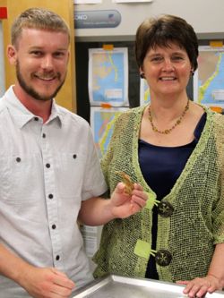 Secretary Holton meets with VIMS Ph.D. student Mark Stratton to learn about his efforts to better understand the coastal food web through analysis of the stomach contents of fishes collected during trawl surveys.