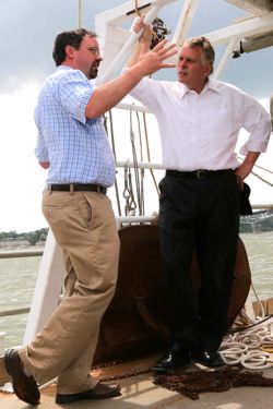 Professor Rob Latour discusses VIMS' multispecies fish surveys with Governor Terry McAuliffe aboard the RV Bay Eagle. ©Michaele White.