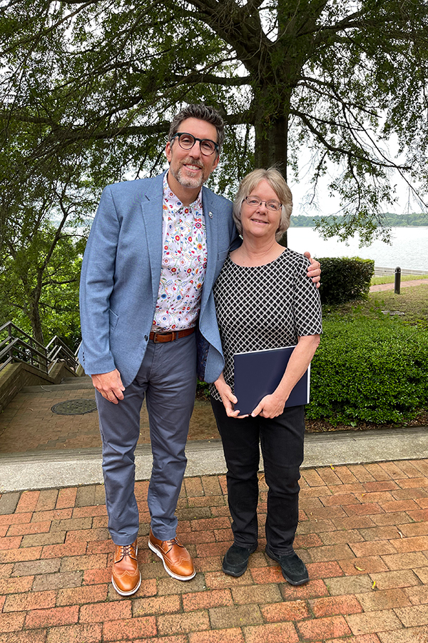 Karen Duhring, winner of the 2021 PPF Outreach Award, with Dean & Director Dr. Derek Aday. 